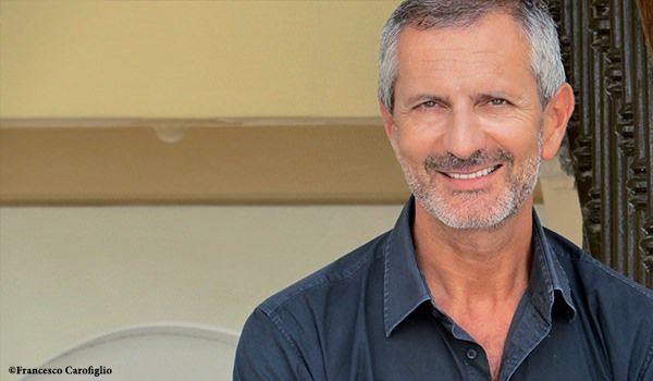 Carofiglio: «Riace un modello virtuoso da replicare»